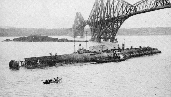 The Von Der Tann Passing Beneath The Forth Bridge On Its Way To The Breaker’S Yards At Rosyth. The Island Of Inchgarvie Is In The Background