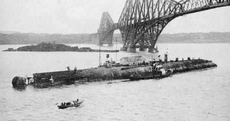 The Von Der Tann Passing Beneath The Forth Bridge On Its Way To The Breaker’S Yards At Rosyth. The Island Of Inchgarvie Is In The Background