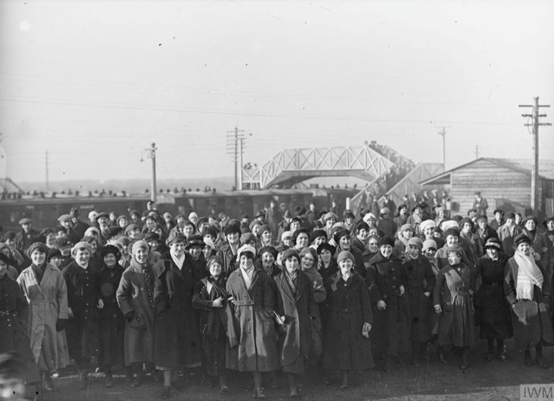 Munitions Workers Arriving At Gretna Station After A Night Shift. Photographed By Horace Nicholls. © IWM Q30560