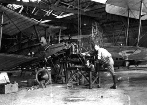 An RFC Ground Mechanic Working On The Engine Of An Se5a,