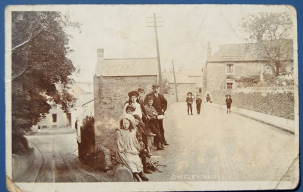 Shotley Bridge, 1905. Jack Wilson (Straw hat, centre of the road) with kid brother Willie. Ages 9 & 7.