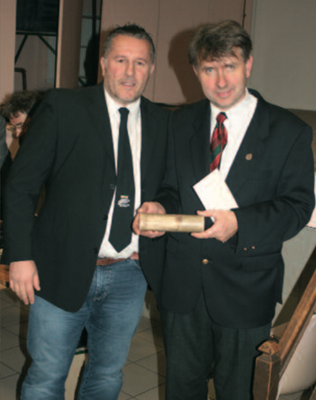 Mike Tipping presents Philippe Gorczynski with the Royal scroll sent to his great grandfathers family.  Photo courtesy of Rob Kirk