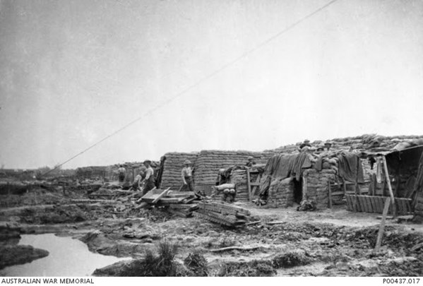 Fleurbaix, France. Soldiers Walk Along The Path Beside The Row Of Front Line Trenches (Image – Awm.Gov.Au)