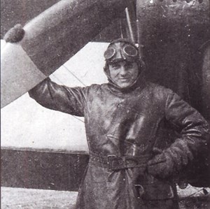 W E Johns Pictured In A Flying Suit Whilst An Instructor. He Is Standing In Front Of An RE8.