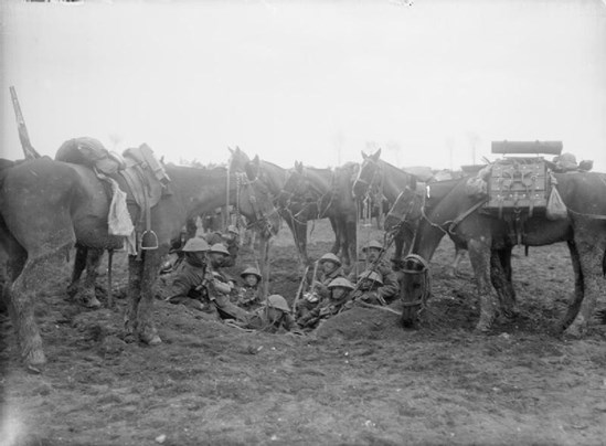 Battle Of The Scarpe. British Cavalry Resting On The Arras Cambrai Road, April 1917. IWM (Q2032)