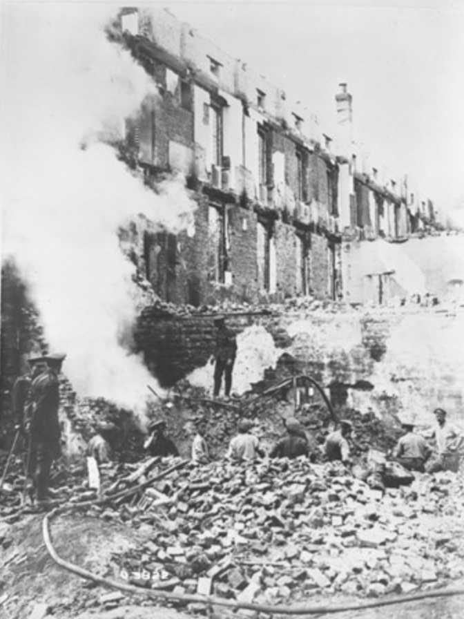 Soldiers Searching Through The Ruins Of The Hospital