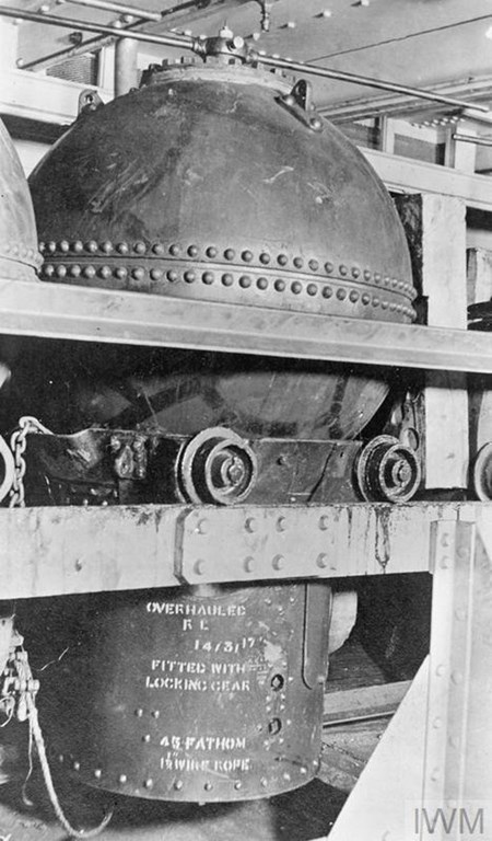 A Mine Stowed On Rails Between Decks. (IWMQ52968)