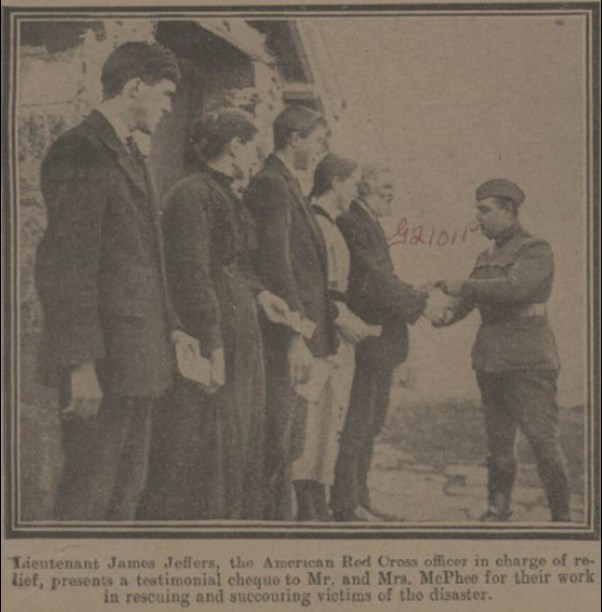 A Daily Mirror Picture Showing The Mcphee Family Receiving A Testimonial Cheque From Lt James Jeffers Of The American Red Cross.