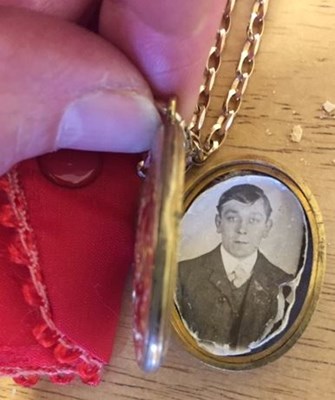 A Locket, With Robert's Photo In The Centre, Which Has Been Passed Down The Generations.