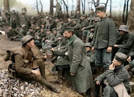 One Of A Number Of German Prisoners Captured At The Battle Of St. Quentin Is Offered A Flask Of Water By A British Soldier, 22 March 1918. Source IWM Q 10773