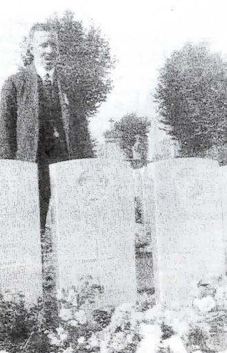 Mrs Margaret Horey Laying Flowers As The Grave Of Her Son.