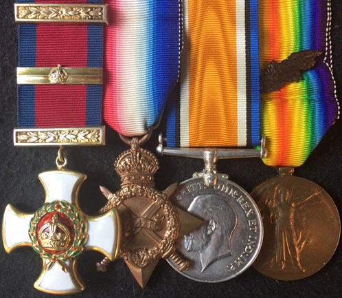 A Group Of WW1 Medals Including A DSO And Bar
