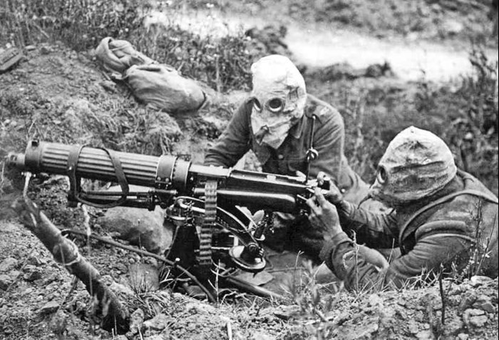 A Crew Of A Vickers Machine Gun Wearing The Anti Gas Helmets Of The Day