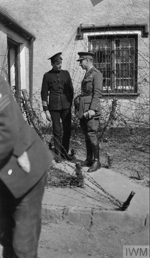 Brigadier General H. W. Higginson, The CO Of The 17Th Infantry Brigade, In Conversation With A Sergeant Of The Royal Irish Constabulary At The Ballinhassig Barracks In 1920