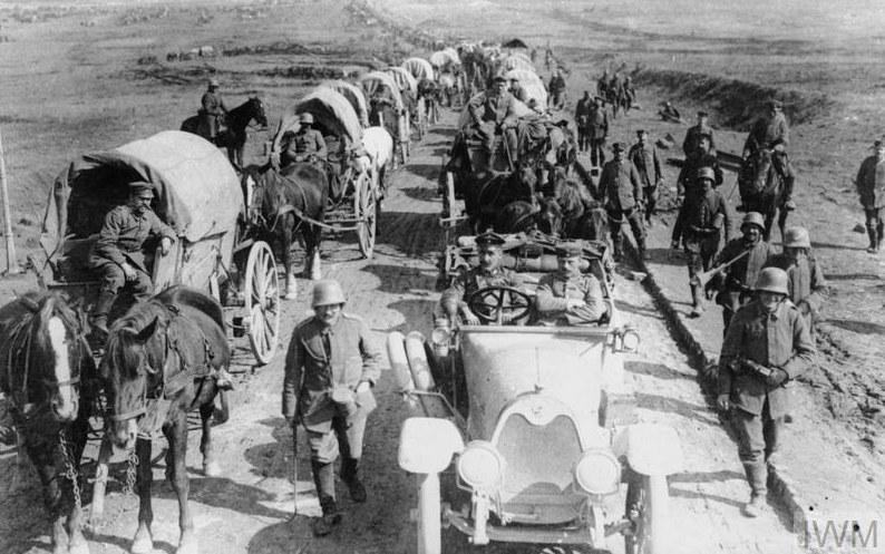 A German transport column moving forward along the Albert-Bapaume road, March 1918. © IWM (Q 60474)