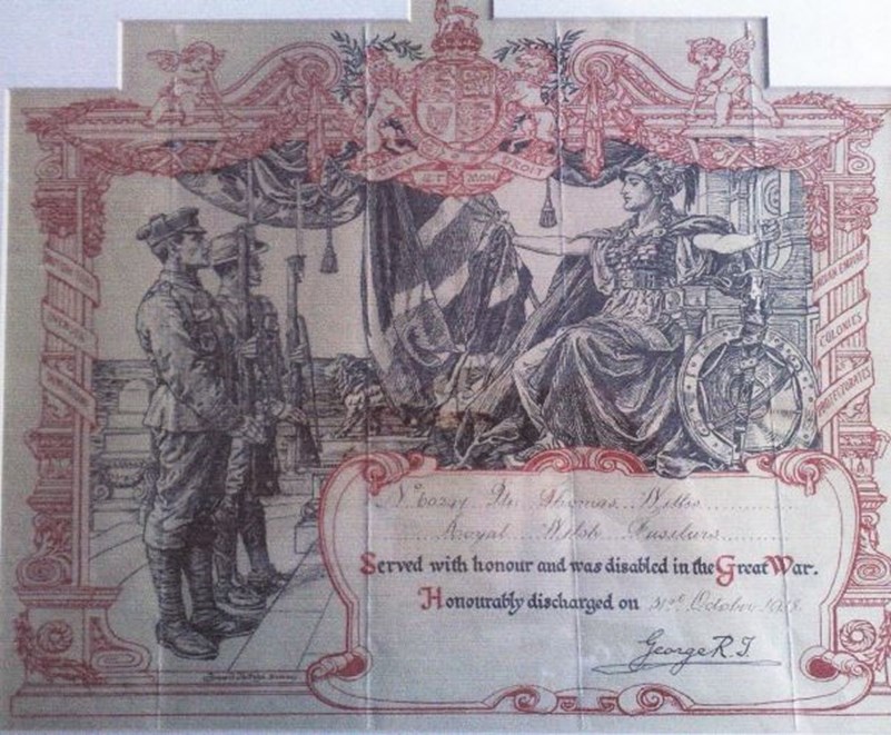 A Scroll Recording Thomas’S Honourable Discharge After He Lost His Leg