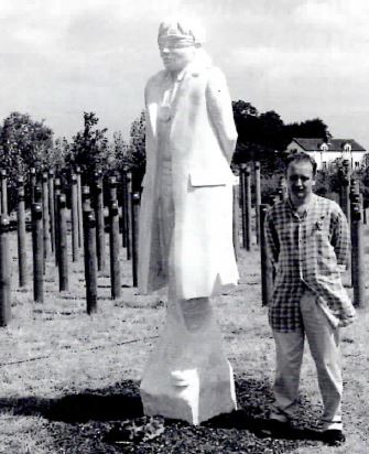 Sculptor Andy Decomyn With His Memorial At The Unveiling Ceremony.