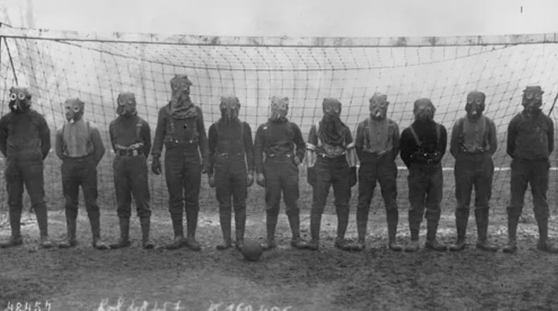 Footballers In Gas Masks