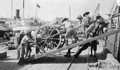 One Of The First British Army Guns To Arrive In Baku Is Manhandled Down A Gangplank Into The Port