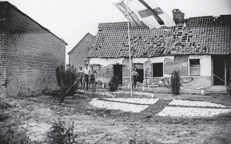 Several Soldiers Stand Outside A Dressing Station