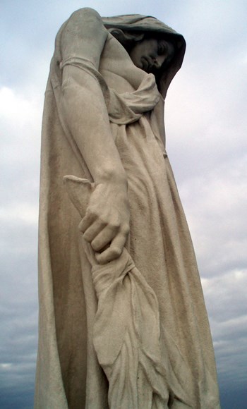 One Of The Grieving Figures Representing The Bereaved Of Canada.