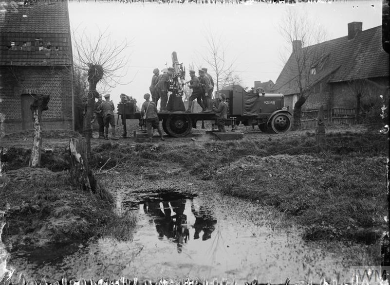 Probably Men Of The Royal Horse Artillery With A 13 Pounder 9 Cwt Anti Aircraft Gun On Mark III Motor Lorry Mounting, On The Outskirts Of Armentieres. March 1916. IWM Q462