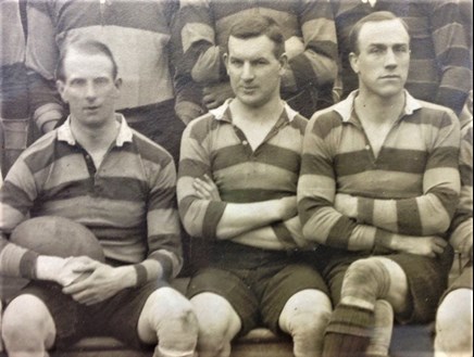 Percy Fussell Sits Between His Captain Edgar Mobb