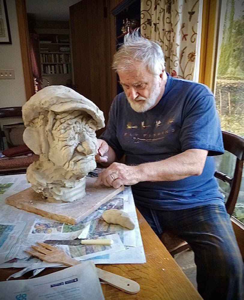 Artist Bruce Mcnally Sculpting A Head