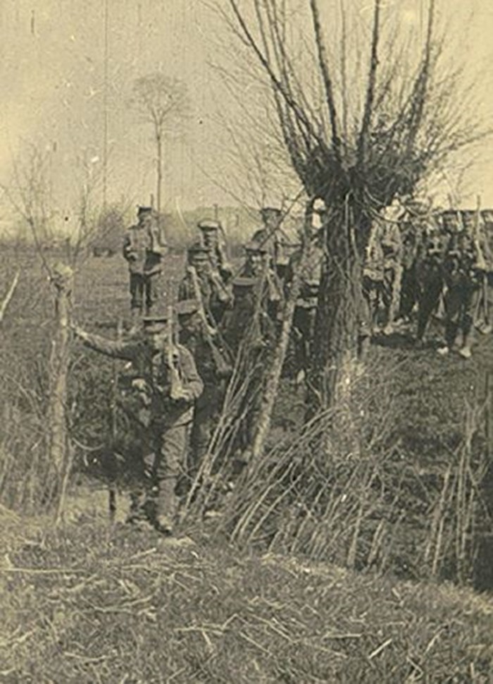 A Column Of 10 Platoon C Company In A Field.