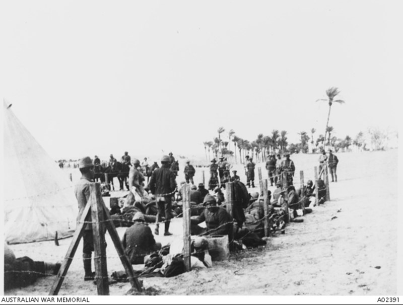 Captured Turkish Prisoners In A Temporary Compound At El Arish After Having Been Captured At Rafa. (AWM A02391)