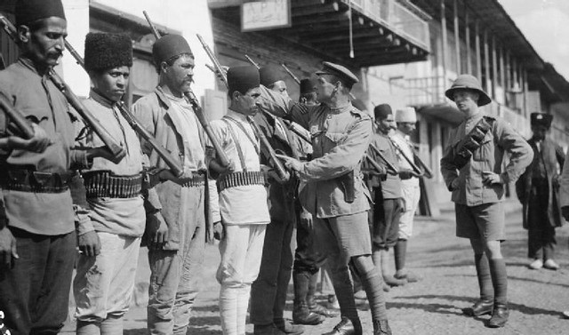 A British officer from the Dunsterforce watches a Russian instructing a group of Persian police at Resht