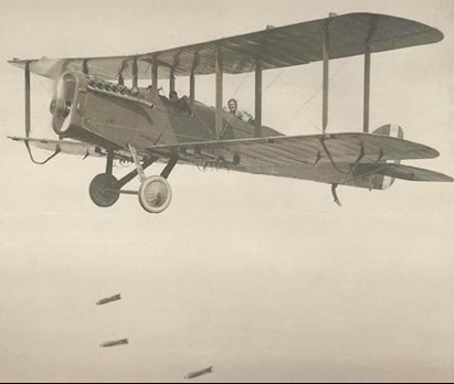 A (U.S. Built) DH 4 Releasing Bombs.