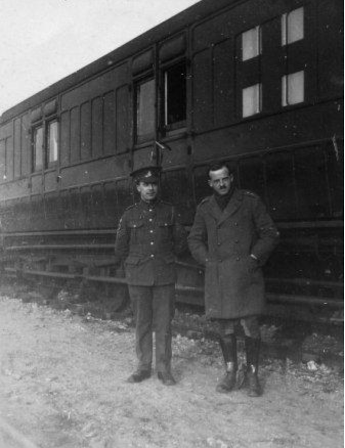 2 Soldiers Infront Of Ambulance Train