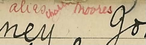 A close-up of the 'Charles Moores' alias on the Sweeney card