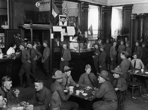 Interior Of The Casino In Aix Les Bains, France, Now Used By The YMCA, Showing The Old Bar In La Salle De Bacchus. YMCA Girls Are Serving Refreshments To The Boys (Circa 1918)