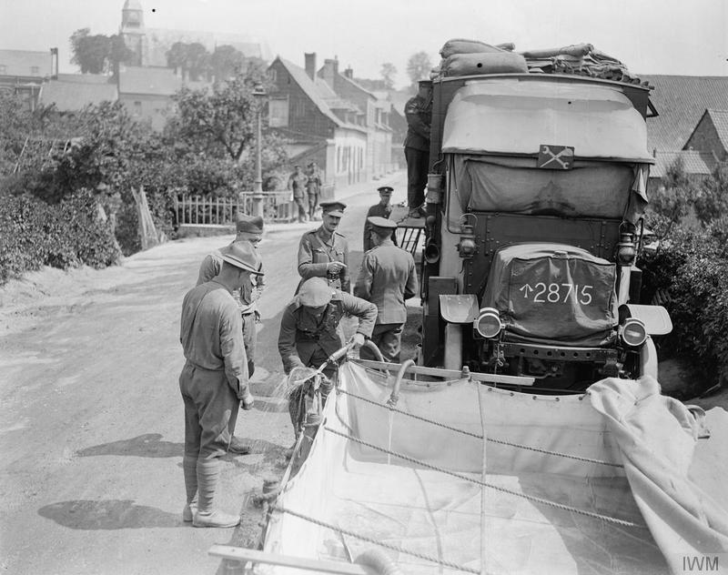 Water From The River Authie Having Passed Through The Depoisoning And Sterilising Plant Of No. 2 Water Tank Company ASC (Attached To The 718Th Motor Transport Company, Army Service Corps), Enters The Canvas Tank Pure. Auxi