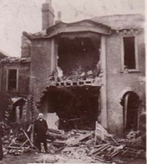 Mr Ellis Wounded By A Bomb And His Ruined House At Lancaster Corner, St Peters Plain” From A Postcard