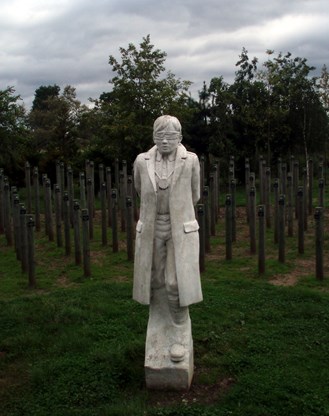 A More Recent Picture Of The Memorial With The Rows Of Wooden Stakes Each Representing A Man.
